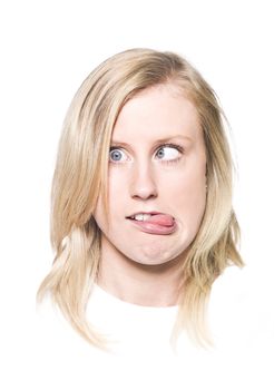 Girl making a funny face isolated on a white background