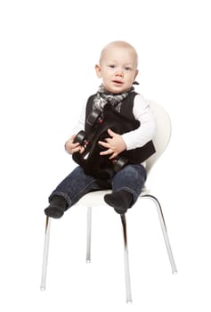 Young baby boy huging a toy isolated on a white background