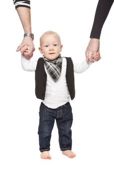 Young baby holding hands with his parents against white