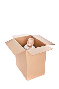 Baby boy in a box isolated against a white background