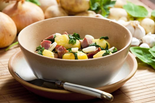 potatoes with smoked meat, spinach and garlic