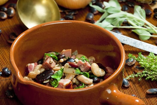 mixture of beans with smoked meat