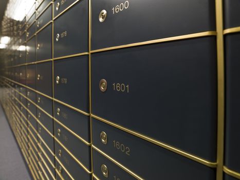 Rows of luxurious safe deposit boxes in a bank vault