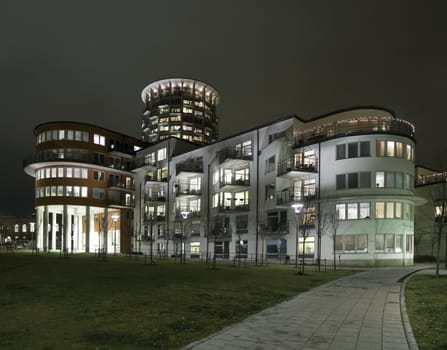 Recidential buildings at night with modern architecture