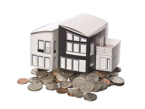House model standing on american coins isolated on a white background