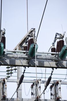 Close up on a power cable with a blue sky background.