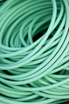 Close up on a green garden hose