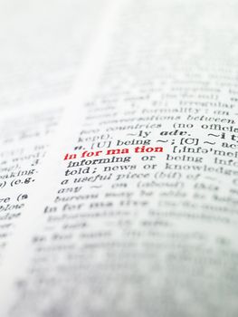 The word 'information' highlighted in a dictionary
