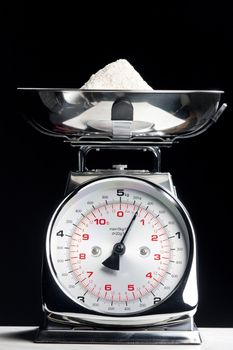 kitchen scales with flour