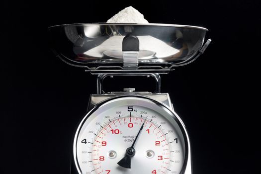 kitchen scales with flour