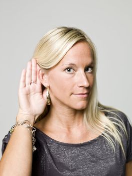Portrait of a woman listening