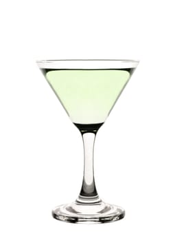 A cocktail glass with green liquid in it. 