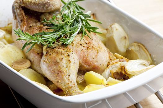 chicken baked with onion and potatoes