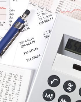 Office Supplys, including calculator, pen and papers.