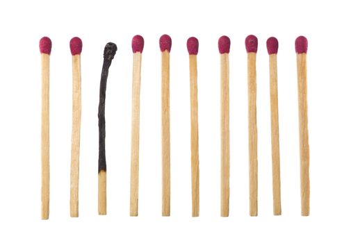 Matches on a row with one burned down.