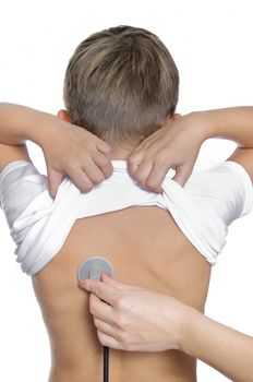 doctor or paediatrician examines a childs chest or heard using a stethoscope