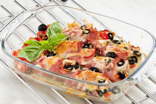 baked ham rolls filled with chicken meat and black olives