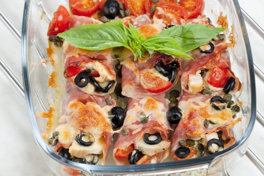 baked ham rolls filled with chicken meat and black olives