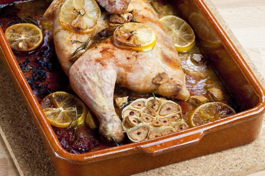 chicken baked on lemons