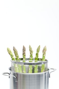 green asparagus in pot