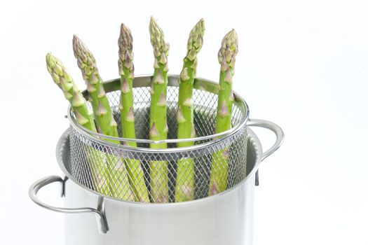 green asparagus in pot