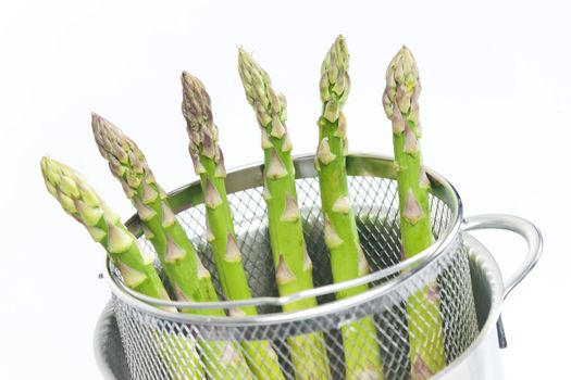 green asparagus in pot