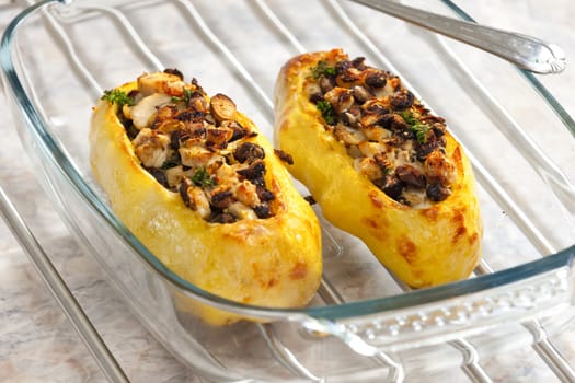 chicken meat with black beans baked in potatoes