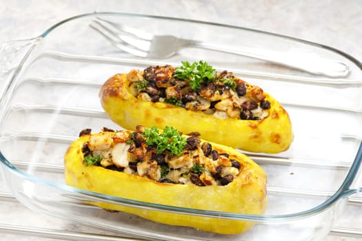 chicken meat with black beans baked in potatoes