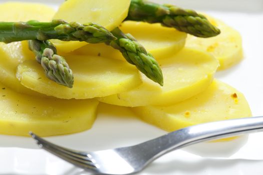 cooked potatoes with asparagus