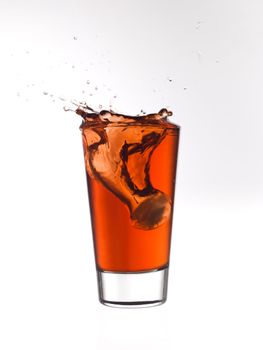 Splash in a glass of red lemonade