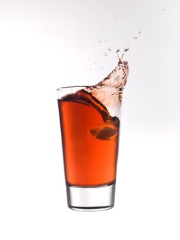 Splash in a glass of red lemonade