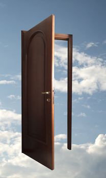 Open wooden door in a blue sky with clouds