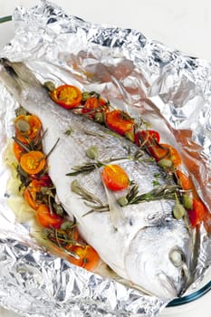bream baked with herbs and cherry tomatoes