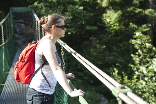 tourist girl on hanging bridge - Slovak Paradise National Park