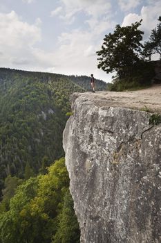 woman standing on big rock - Tomasovsky Vyhlad in Slovak Paradise