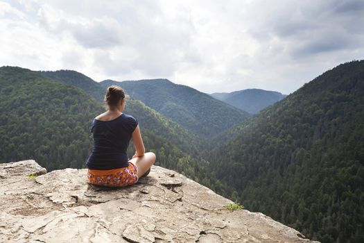 beautiful woman meditating on big rock, Tomasovsky Vyhlad - Slovak Paradise