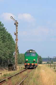 Passenger train entering the station
