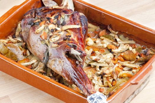 venison rump baked on vegetables with bay leaf and Jamaica pepper