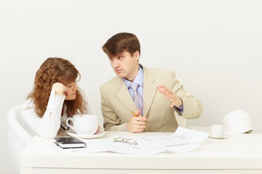 The businessman explains to the missing tired girl drinking many coffee
