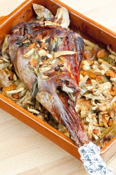 venison rump baked on vegetables with bay leaf and Jamaica pepper