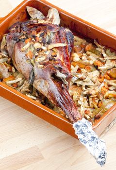 venison rump baked on vegetables with bay leaf and Jamaica pepper