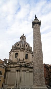 Trajan's column reaching into the blue sky, Rome, Italy