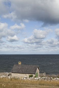 Old farmhouse by the water