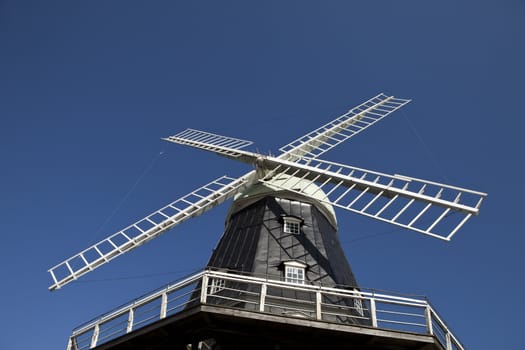 Windmill towards blue sky