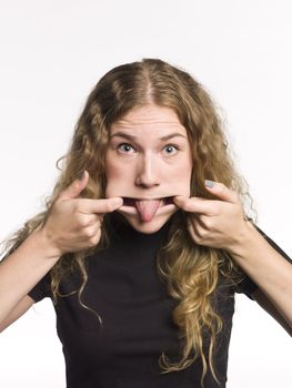 Portrait of a woman making a funny face