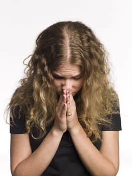 Portrait of a praying woman