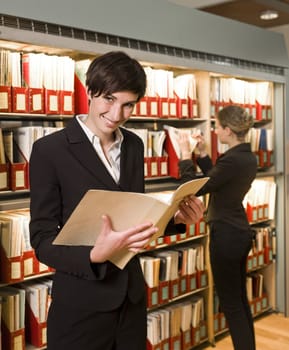 Two women at a library