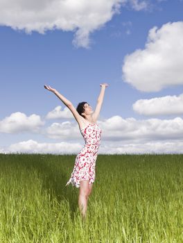 Young woman standing on a field