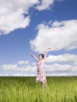 Young woman standing on a field