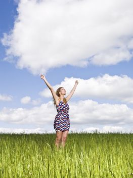 Young woman standing on a field